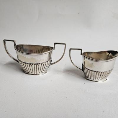 Sale Photo Thumbnail #281: DM74. Antique Sterling Silver Queen Anne Creamer & Sugar Bowl

Dimensions: Creamer – 3x4x2, Sugar – 3x6x2.5
Damage: Normal wear
