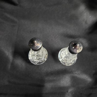 Sale Photo Thumbnail #293: DM76. Antique Wedgwood Crystal Salt & Pepper Shakers with Silver Tops

Dimensions: 4x2x2
Damage: Normal wear