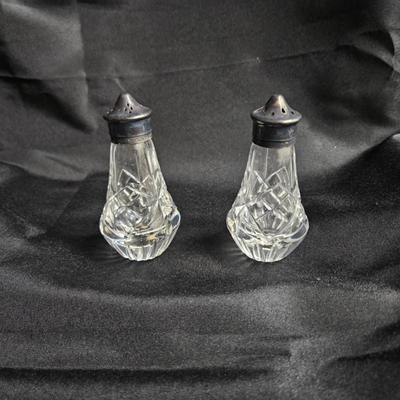 Sale Photo Thumbnail #292: DM76. Antique Wedgwood Crystal Salt & Pepper Shakers with Silver Tops

Dimensions: 4x2x2
Damage: Normal wear