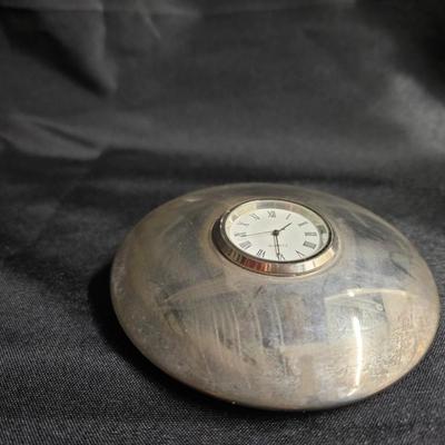 Sale Photo Thumbnail #298: DM77. Chrome and Quartz Desk Clock

Dimensions: 1x4x4
Damage: Normal wear