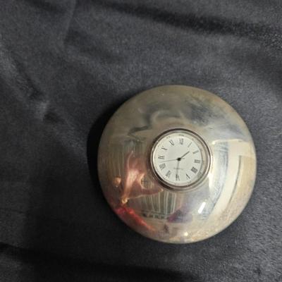 Sale Photo Thumbnail #300: DM77. Chrome and Quartz Desk Clock

Dimensions: 1x4x4
Damage: Normal wear