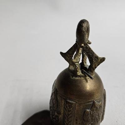 Sale Photo Thumbnail #307: DM80. Antique Asian Thai Brass Bell
Description: Possibly a temple bell
Dimensions: 7x1.5x1.5
Damage: Normal wear