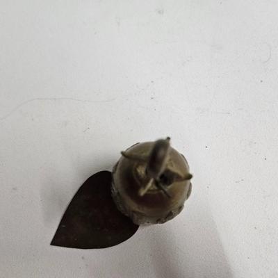 Sale Photo Thumbnail #308: DM80. Antique Asian Thai Brass Bell
Description: Possibly a temple bell
Dimensions: 7x1.5x1.5
Damage: Normal wear