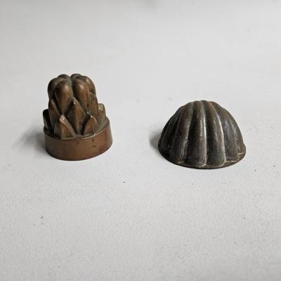 Sale Photo Thumbnail #310: Antique Metal Jelly/Candy Molds

Dimensions: 2x2x2
Damage: Normal wear