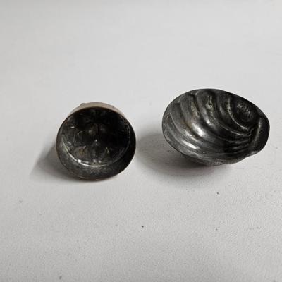 Sale Photo Thumbnail #312: Antique Metal Jelly/Candy Molds

Dimensions: 2x2x2
Damage: Normal wear