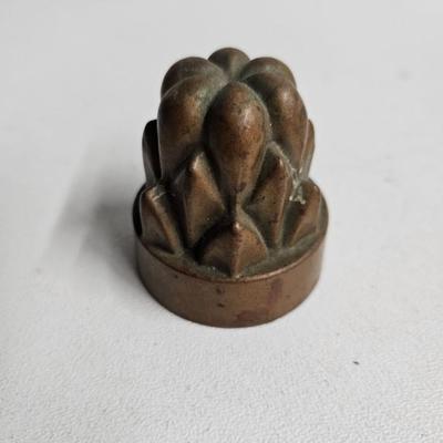 Sale Photo Thumbnail #313: Antique Metal Jelly/Candy Molds

Dimensions: 2x2x2
Damage: Normal wear