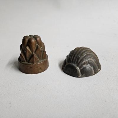 Sale Photo Thumbnail #309: Antique Metal Jelly/Candy Molds

Dimensions: 2x2x2
Damage: Normal wear