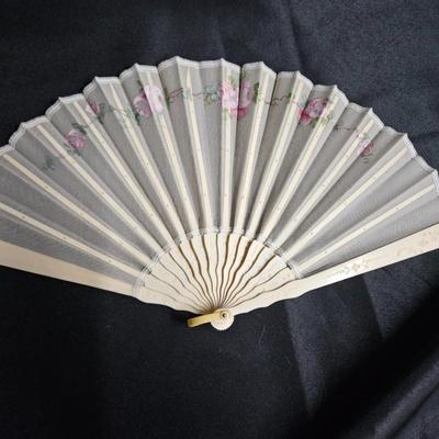 Sale Photo Thumbnail #325: Antique French Hand-Painted Transparent Hand Fan
Description: Floral and vine, in original box
Dimensions: Fan – 8x14, box – 1.5x10x1.5
Damage: Normal wear