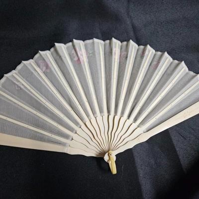 Sale Photo Thumbnail #326: Antique French Hand-Painted Transparent Hand Fan
Description: Floral and vine, in original box
Dimensions: Fan – 8x14, box – 1.5x10x1.5
Damage: Normal wear