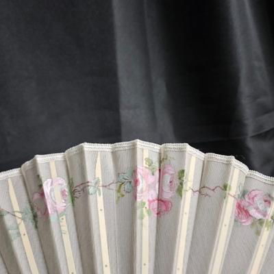 Sale Photo Thumbnail #327: Antique French Hand-Painted Transparent Hand Fan
Description: Floral and vine, in original box
Dimensions: Fan – 8x14, box – 1.5x10x1.5
Damage: Normal wear