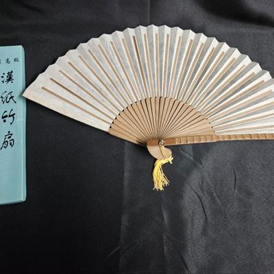 Sale Photo Thumbnail #334: Chinese Hand-Painted Hand Fan
Description: Made of paper and wood, in the original box
Dimensions: Fan – 12x20, Box – 2x12x0.5
Damage: Normal wear