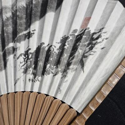 Sale Photo Thumbnail #337: Chinese Hand-Painted Hand Fan
Description: Made of paper and wood, in the original box
Dimensions: Fan – 12x20, Box – 2x12x0.5
Damage: Normal wear