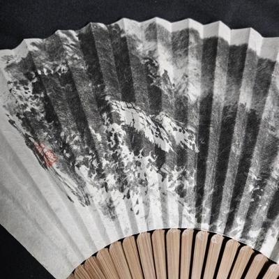 Sale Photo Thumbnail #335: Chinese Hand-Painted Hand Fan
Description: Made of paper and wood, in the original box
Dimensions: Fan – 12x20, Box – 2x12x0.5
Damage: Normal wear
