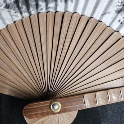 Sale Photo Thumbnail #338: Chinese Hand-Painted Hand Fan
Description: Made of paper and wood, in the original box
Dimensions: Fan – 12x20, Box – 2x12x0.5
Damage: Normal wear