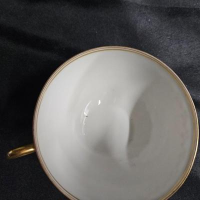 Sale Photo Thumbnail #382: Old Abby Limoges Porcelain Cups & Saucers
Description: 3 cream soup cups, 2 teacups, 5 saucers

Damage: Normal wear