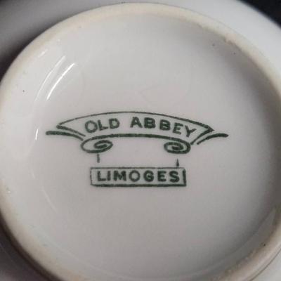 Sale Photo Thumbnail #380: Old Abby Limoges Porcelain Cups & Saucers
Description: 3 cream soup cups, 2 teacups, 5 saucers

Damage: Normal wear