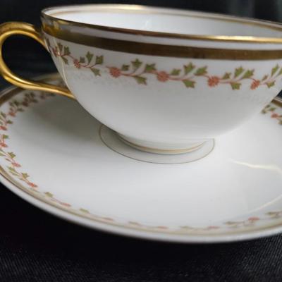 Sale Photo Thumbnail #388: Old Abby Limoges Porcelain Cups & Saucers
Description: 3 cream soup cups, 2 teacups, 5 saucers

Damage: Normal wear
