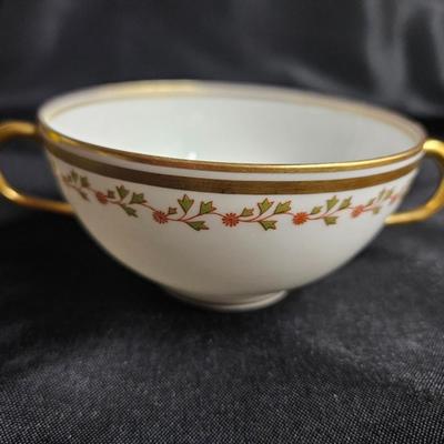 Sale Photo Thumbnail #377: Old Abby Limoges Porcelain Cups & Saucers
Description: 3 cream soup cups, 2 teacups, 5 saucers

Damage: Normal wear