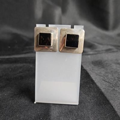 Sale Photo Thumbnail #389: Sterling Silver Square Post Earrings with Onyx

Damage: Normal wear