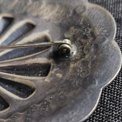 Sale Photo Thumbnail #405: Southwestern Oval Sterling Silver Pin 

Damage: Normal wear