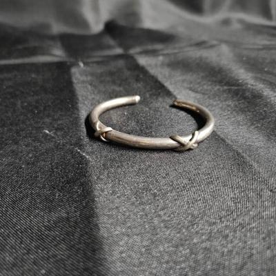 Sale Photo Thumbnail #412: Vintage Sterling Silver Bangle Bracelet

Damage: Normal wear