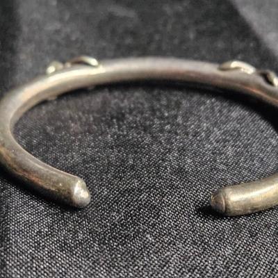 Sale Photo Thumbnail #414: Vintage Sterling Silver Bangle Bracelet

Damage: Normal wear
