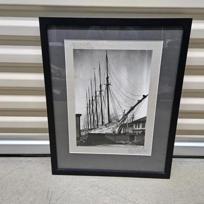 Sale Photo Thumbnail #442: Matted & Framed Photograph of a Masted Schooner 
Description: Signed by the artist
Dimensions: 21x17
Damage: Normal wear