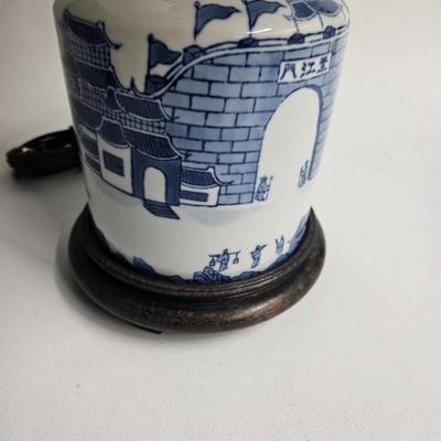 Sale Photo Thumbnail #457: Asian Blue & White Table Lamp on Wooden Base with Shade

Dimensions: With shade – 21x19x19
Damage: Normal wear