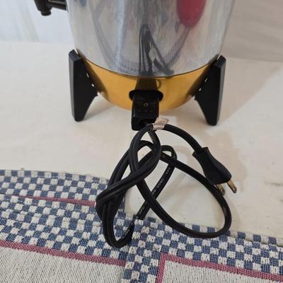 Kitchen & Decor Lot – Coffee Urn, Tupperware Cake Keeper, Placemats, Pottery