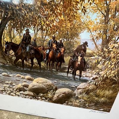 Lot 340 Western print. Men on horseback walking down a river