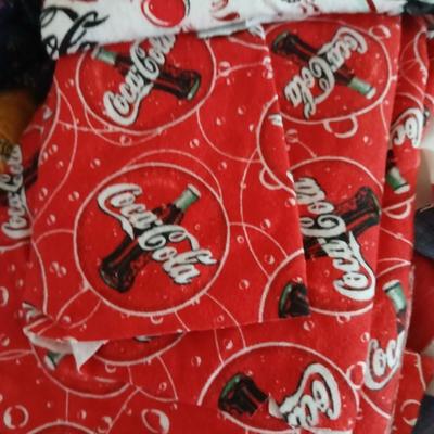 Large Lot of Assorted Cotton & Craft Fabrics – Novelty Prints, Yardage, Panels + Pattern Board in a storage tote