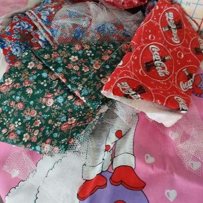 Large Lot of Assorted Cotton & Craft Fabrics – Novelty Prints, Yardage, Panels + Pattern Board in a storage tote