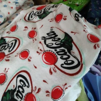 Large Lot of Assorted Cotton & Craft Fabrics – Novelty Prints, Yardage, Panels + Pattern Board in a storage tote