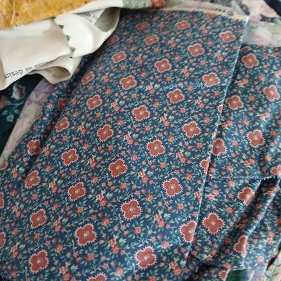 Large Lot of Assorted Cotton & Craft Fabrics – Novelty Prints, Yardage, Panels + Pattern Board in a storage tote