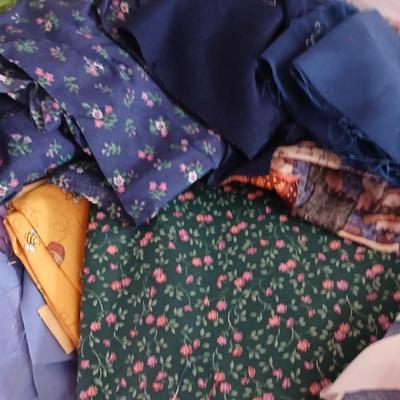 Large Lot of Assorted Cotton & Craft Fabrics – Novelty Prints, Yardage, Panels + Pattern Board in a storage tote