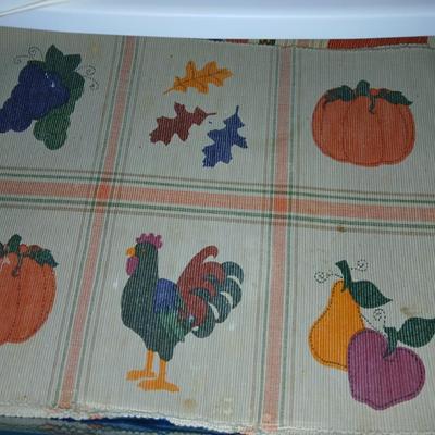 A three-drawer Sterilite cart filled with a festive variety of seasonal table linens and fabric decor