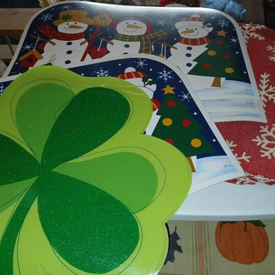 A three-drawer Sterilite cart filled with a festive variety of seasonal table linens and fabric decor