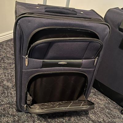 Set of Two Black Rolling Suitcases