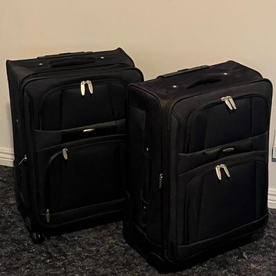 Set of Two Black Rolling Suitcases