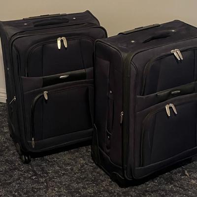 Set of Two Black Rolling Suitcases