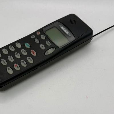 Sale Photo Thumbnail #541: Vintage cell phone from the early 1990's.  Phone only, no box or charger, good physical condition and appearance but untested.  Great as a collectible or as a display item.