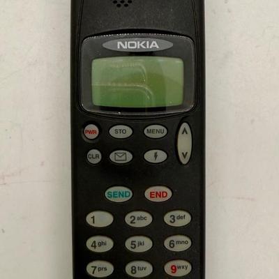 Sale Photo Thumbnail #539: Vintage cell phone from the early 1990's.  Phone only, no box or charger, good physical condition and appearance but untested.  Great as a collectible or as a display item.