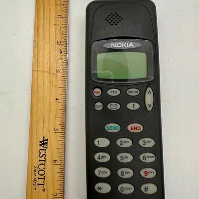 Sale Photo Thumbnail #540: Vintage cell phone from the early 1990's.  Phone only, no box or charger, good physical condition and appearance but untested.  Great as a collectible or as a display item.