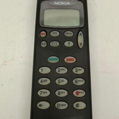 Sale Photo Thumbnail #538: Vintage cell phone from the early 1990's.  Phone only, no box or charger, good physical condition and appearance but untested.  Great as a collectible or as a display item.