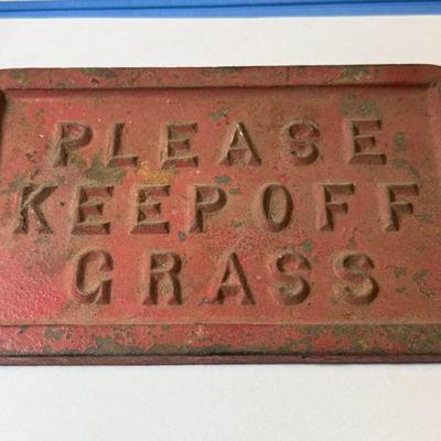 Vintage "KEEP OFF THE GRASS" Heavy Cast Iron 8" x 5" Plate in Good Preowned Condition as Pictured.