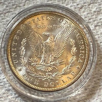 1899-O UNCIRCULATED CONDITION MORGAN SILVER DOLLAR AS PICTURED. (COIN #1832).