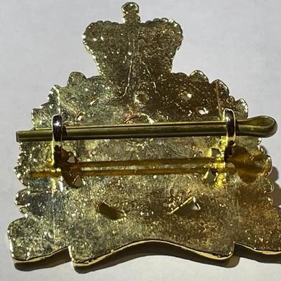 Scarce RCMP Royal Canadian Mounted Police Cap Badge -Gilt & Enameled in VG Preowned Condition.