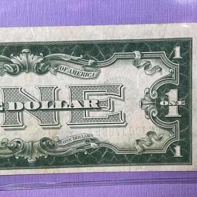 Series of 1928 Crisp AU/Uncirculated Condition "FUNNY BACK" Silver Certificate as Pictured.