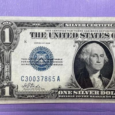 Series of 1928 Crisp AU/Uncirculated Condition "FUNNY BACK" Silver Certificate as Pictured.