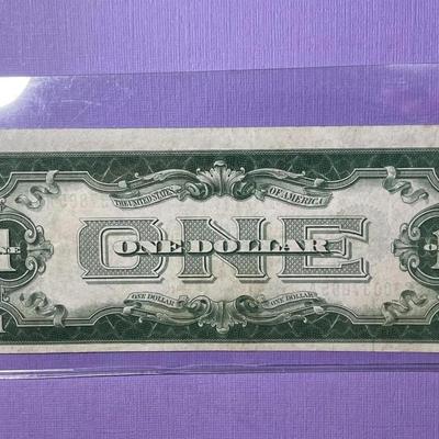 Series of 1928 Crisp AU/Uncirculated Condition "FUNNY BACK" Silver Certificate as Pictured.